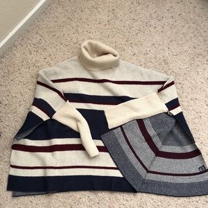 Turtleneck poncho like color-block sweater